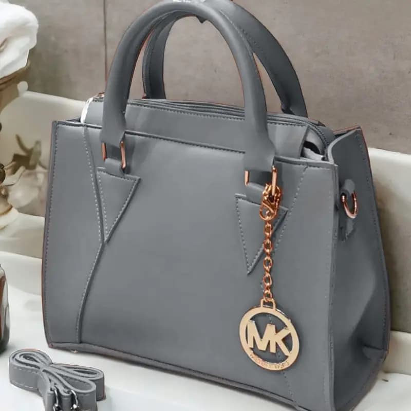 New  High Quality Shoulder Bag For Girls
 Premium Quality
 Attractive  Lock
 Stylish & Unique 
 Size 10 By 8 Inches 
 Unique Handle 
 5 Colours 
 Material : Parachute